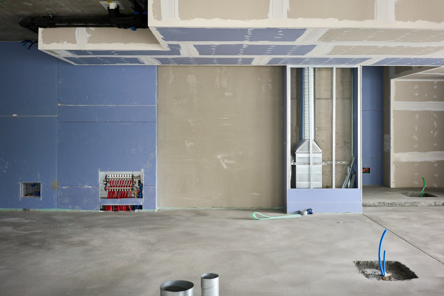 Drywall installation and taping in progress
